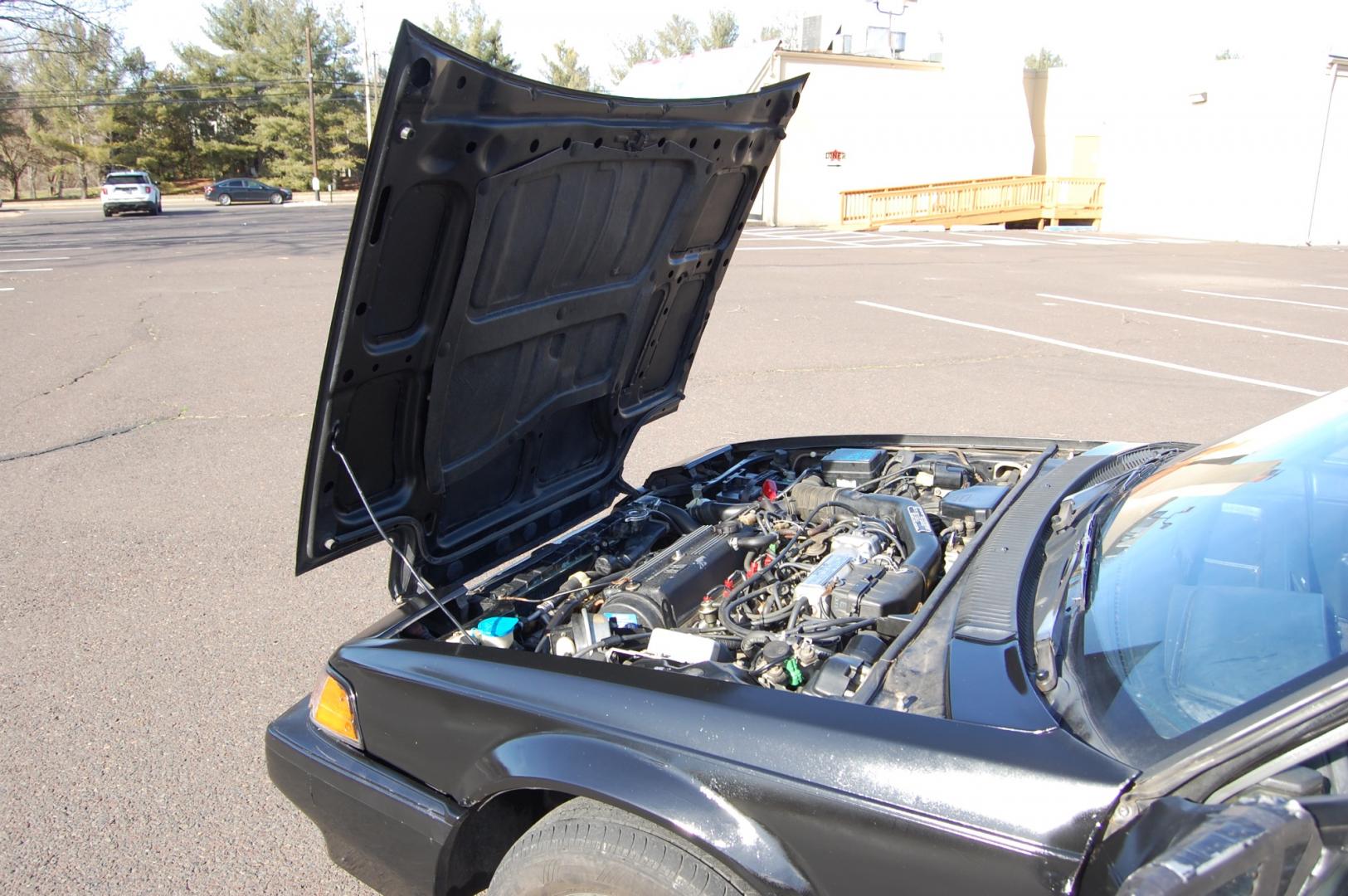 1987 Black /Gray Honda Prelude Si (JHMBA3248HC) with an 2.0L 4 cylinder engine, Automatic transmission, located at 6528 Lower York Road, New Hope, PA, 18938, (215) 862-9555, 40.358707, -74.977882 - Here we have a 1987 Honda Prelude SI with a 2.0L 4 cylinder putting power to the front wheels via an automatic transmission. Options include: gray cloth, power windows/locks/mirrors, AM/FM/TAPE radio, heat/AC, cruise control, tilt steering wheel, 13 inch alloy wheels, pop up headlights and a moon ro - Photo#19